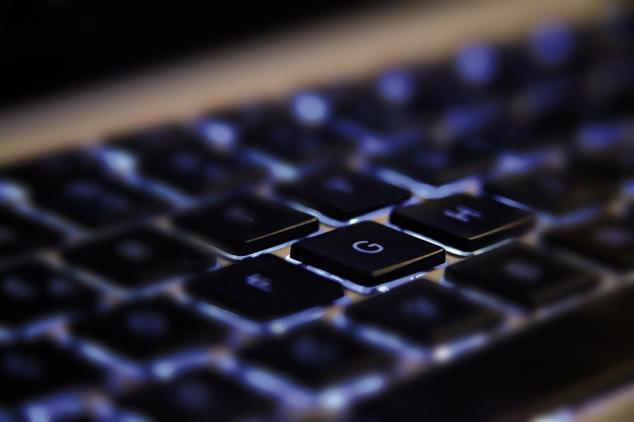 Computer keyboard with blue backlight